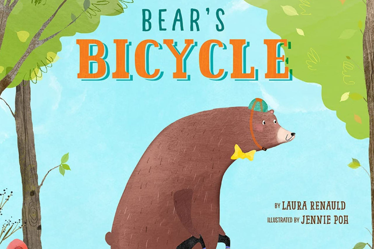 A bear riding a bicycle between two trees. The title reads Bear's Bicycle